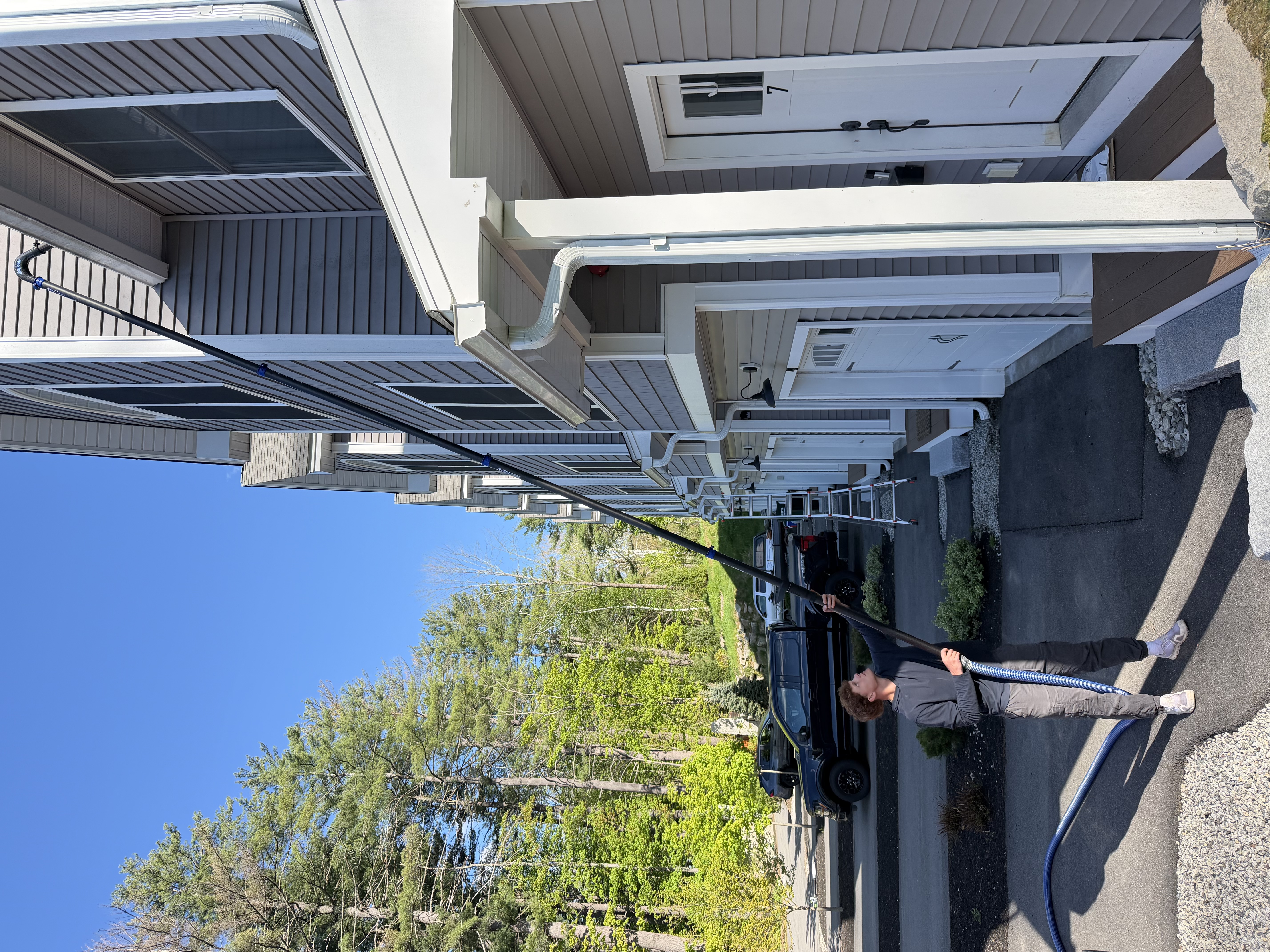 Canaway Gutters cleaning gutters from the ground, no ladders needed